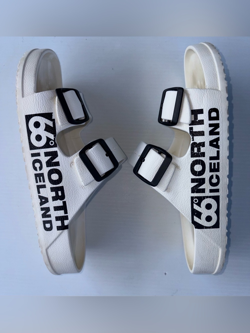 66 Degrees North Iceland Women's White Slide Sandals with Black Buckles